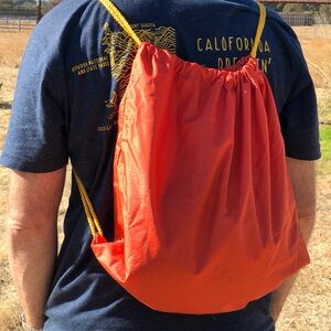 Draw String Backpack Orange And Yellow